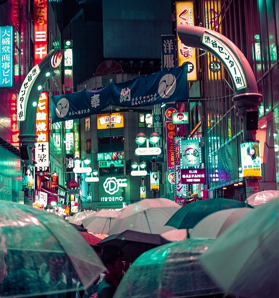 People near buildings during nighttime with lights 2816903